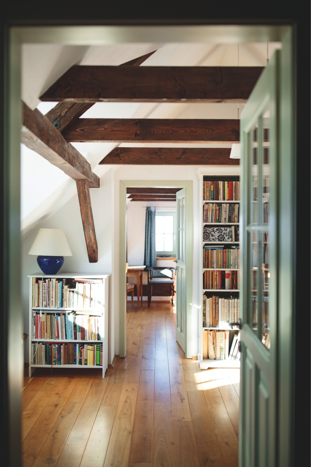 Obytné podkroví s pokojem syna, knihovnou a ložnicí rodičů